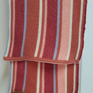 Oleana Striped Knit Scarf in Peaches, Pinks, Blue, And Ivory